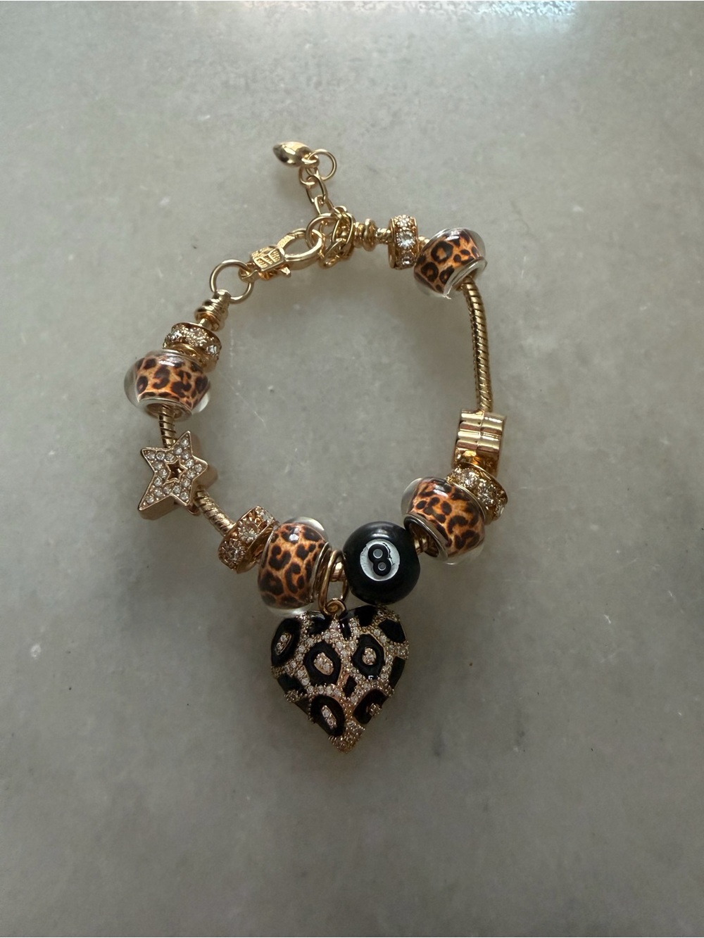 Gold-Tone Leopard Heart Charm Bracelet with Black Accent Bead
